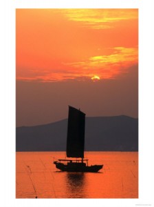 Sail Away A boat sailing away in sunset